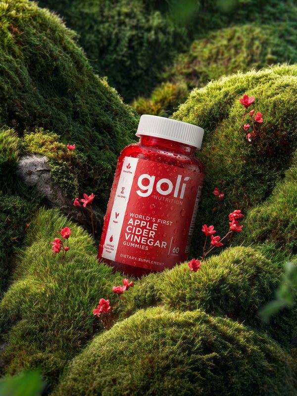 Health product visual: supplement jar on moss